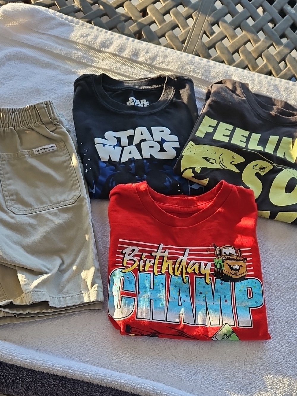 3 - T Shirts Size 6  &          1 Calvin Klein Shorts    Size 5
